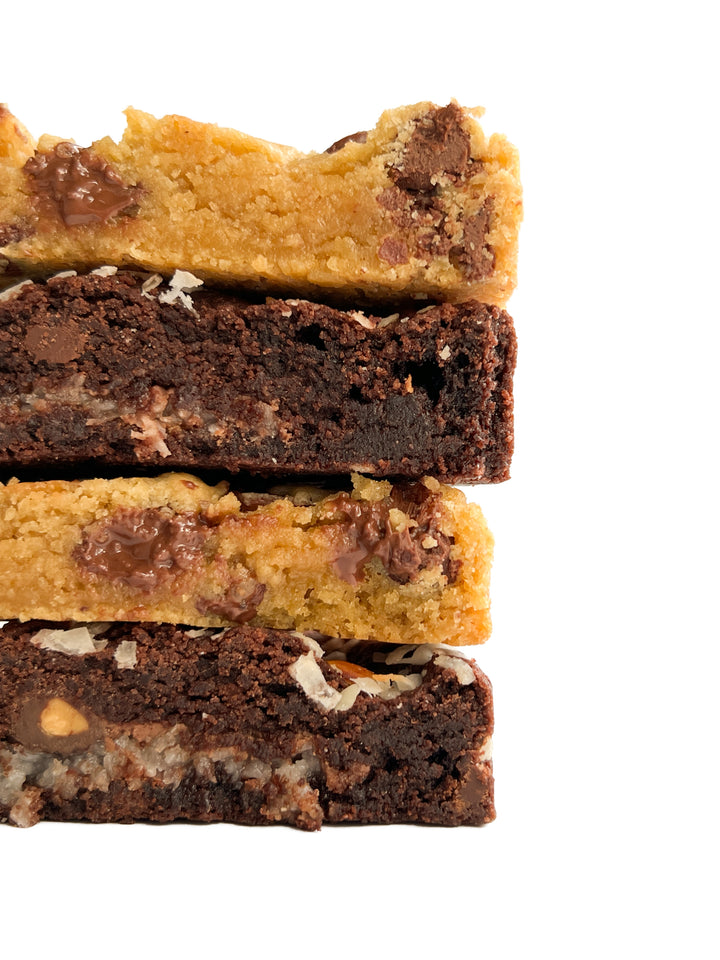 Chocolate chip and brownie stuffed cookie halves stacked four high